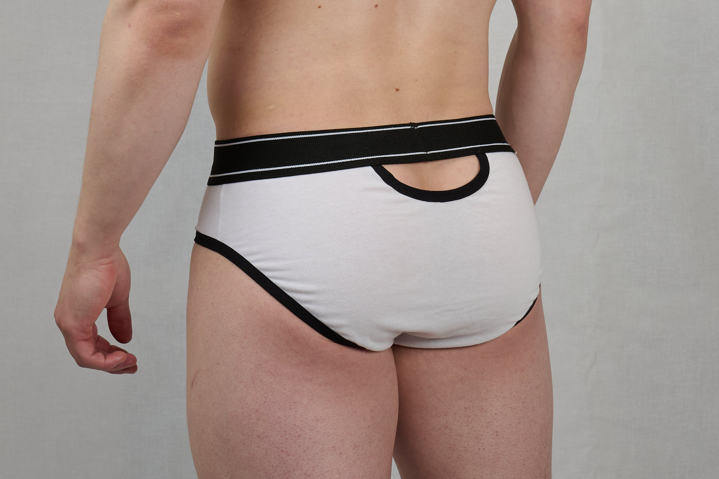 Briefs or jockstrap with holes both front and back - White