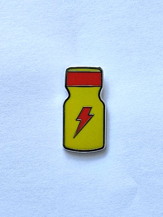 Discover Dickfashion's popper bottle pin with lightning, a pin that is fun and unique