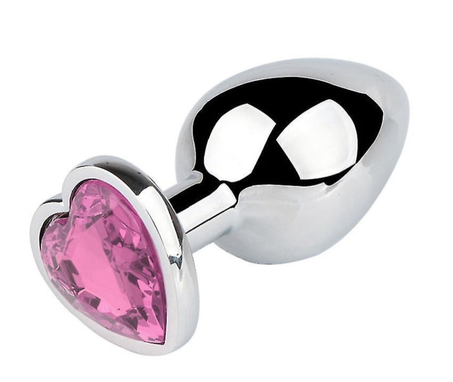 Buttplugg i nickelfritt stål med kristallhjärtan i rosa, lila, blått och transparent färg