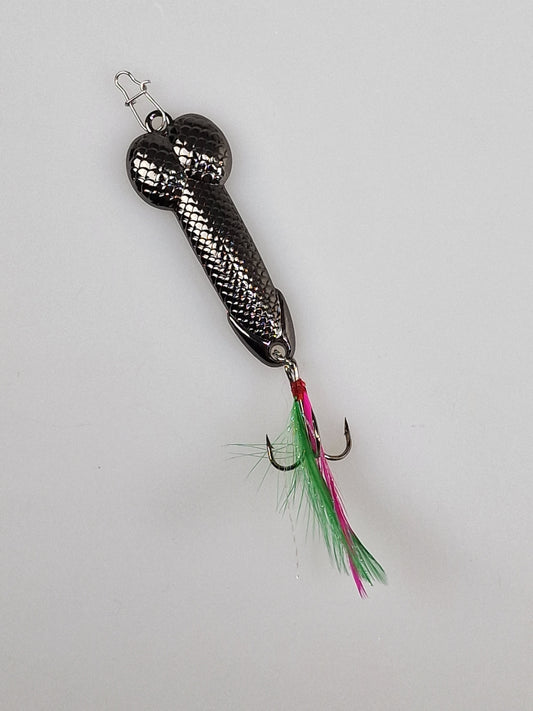 Fishing lure cock with feathers in black metal