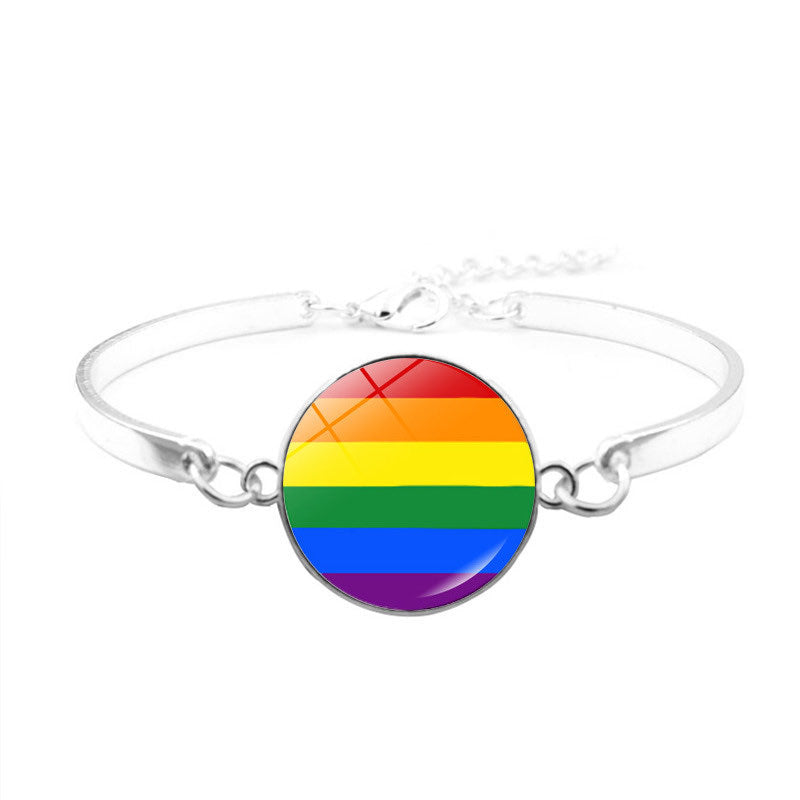 Pride smycken, halsband,  armband och örhängen. Ett set regnbågs smycken