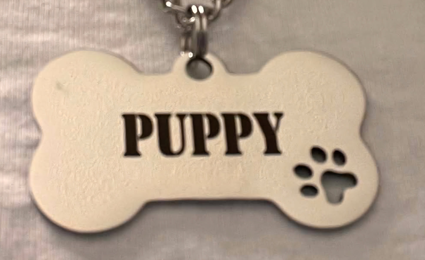 Halsband, tjock kedja, med ben för valpar som gillar puppy play med texterna, good boy, WOOF eller puppy