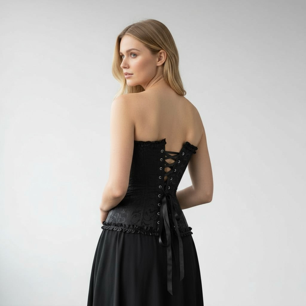 Svart korsett med spets och snörning