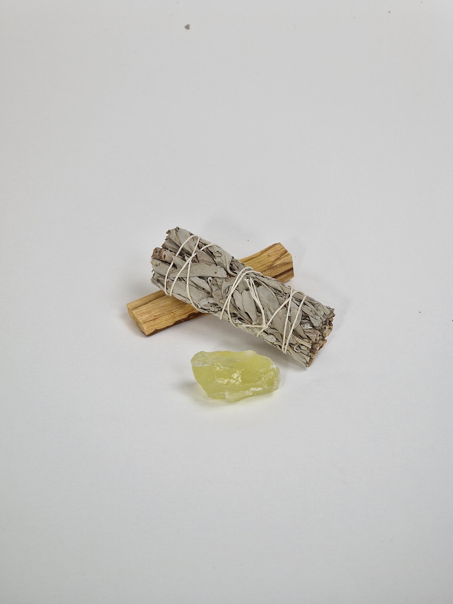 Citrine kristall med salvia och smudge stick