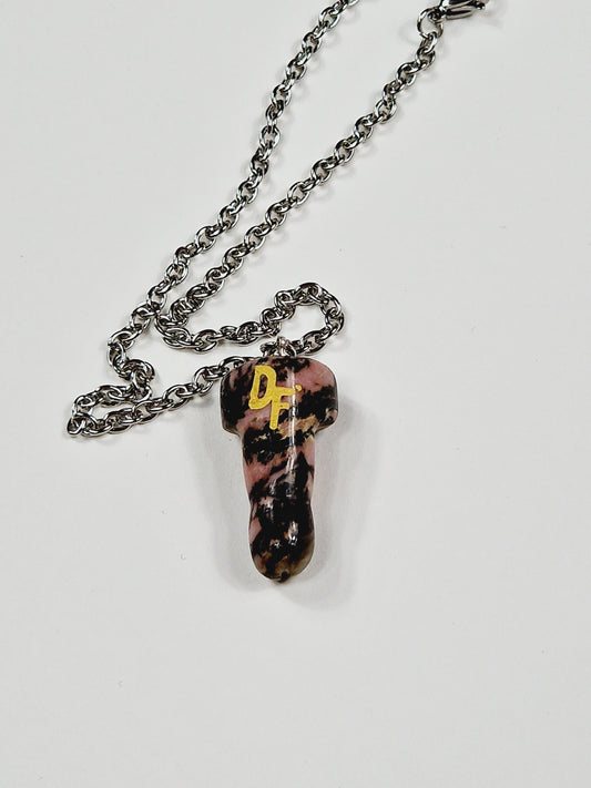 Necklace of the crystal or semi-precious stone Rhodonite