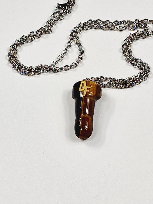 Necklace with pendant of the crystal tiger's eye